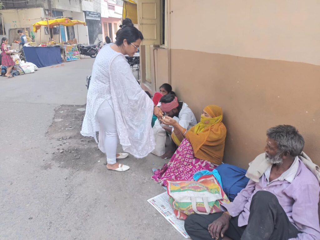 BISCUITS DISTRIBUTION TO NEEDY PEOPLE AT INDORE