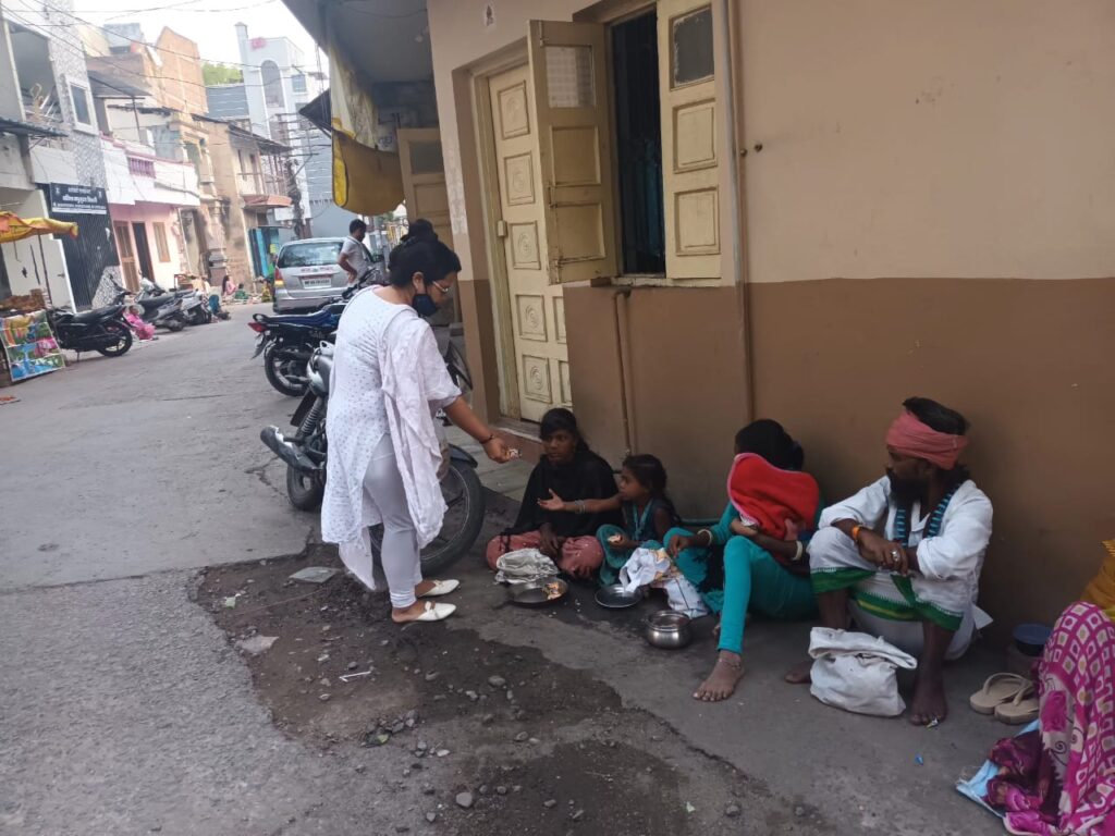 BISCUITS DISTRIBUTION TO NEEDY PEOPLE AT INDORE