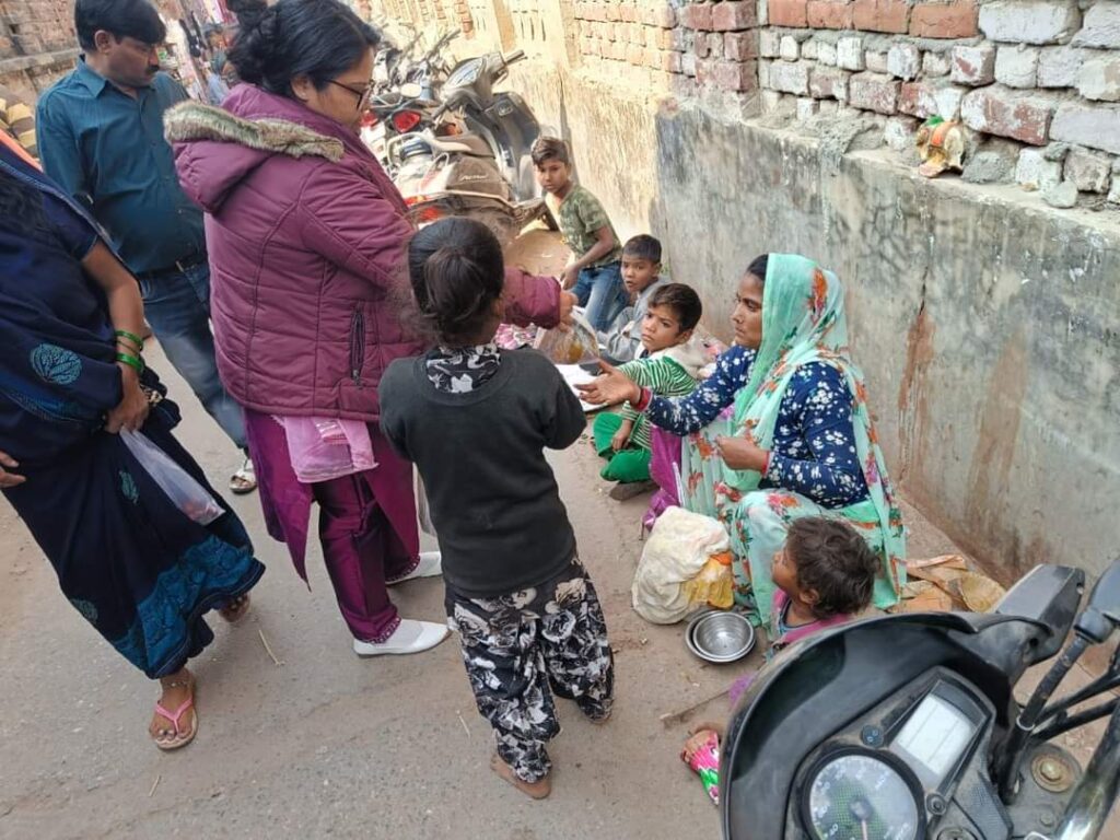 FOOD PACKET DISTRIBUTION TO NEEDY PEOPLE AT AGRA