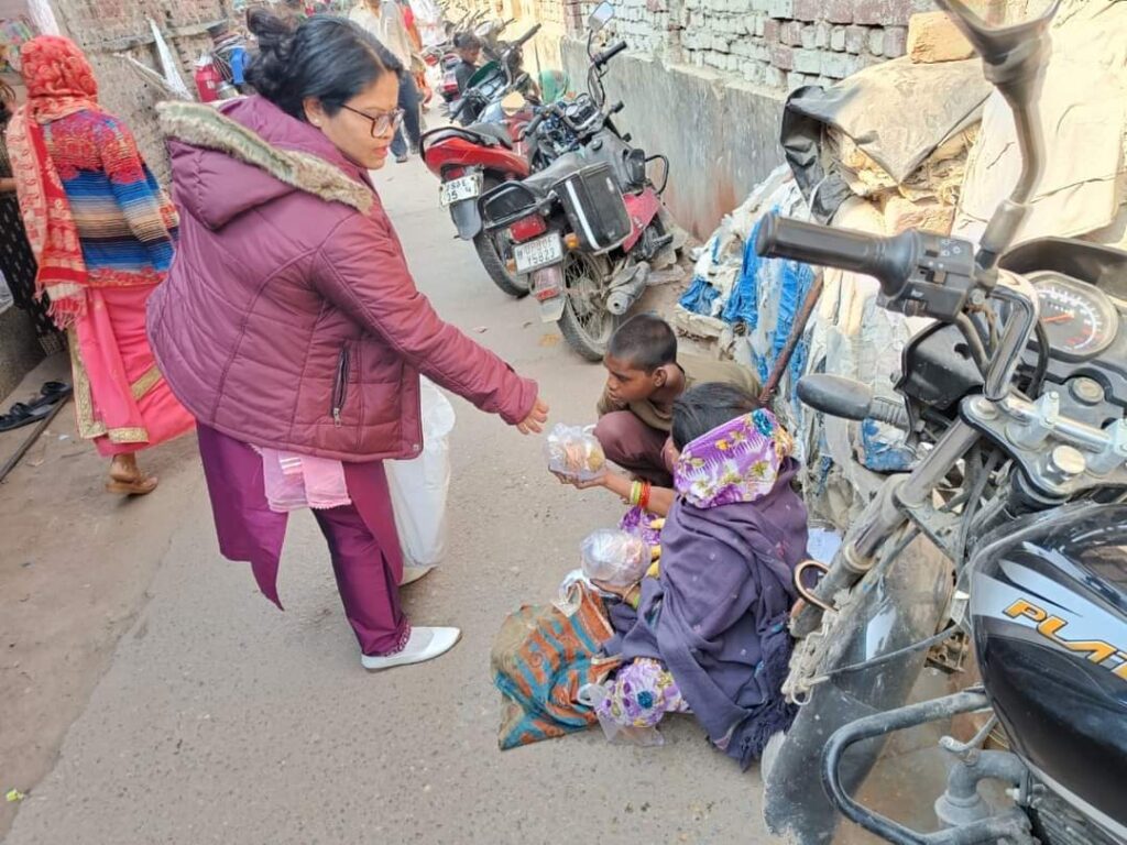 FOOD PACKET DISTRIBUTION TO NEEDY PEOPLE AT AGRA